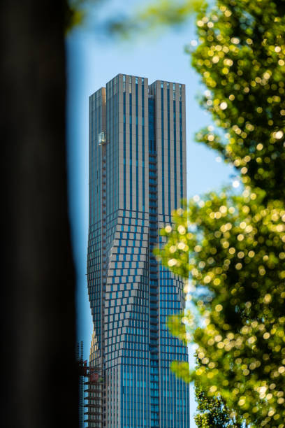 Gothenburg, Sweden - June 25 2024: Karlatornet high rise behind a tree.