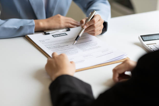 istock Job searching, Applicants submit application documents and resumes during job interviews in the office. Job interview 2173720369