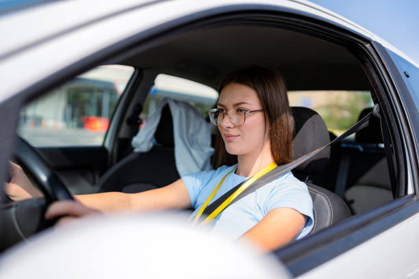 istock Woman driver focused inside car with seatbelt on 2173720398