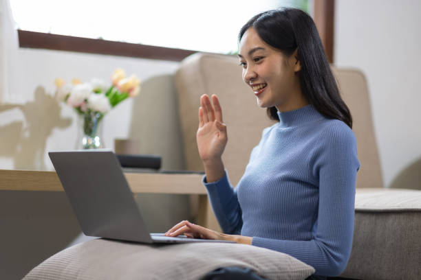 istock Work from home, Happy Asian woman using laptop at home. 2173720721