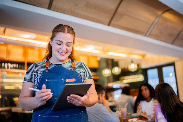 istock Waitress working at coffee shop 2173723901