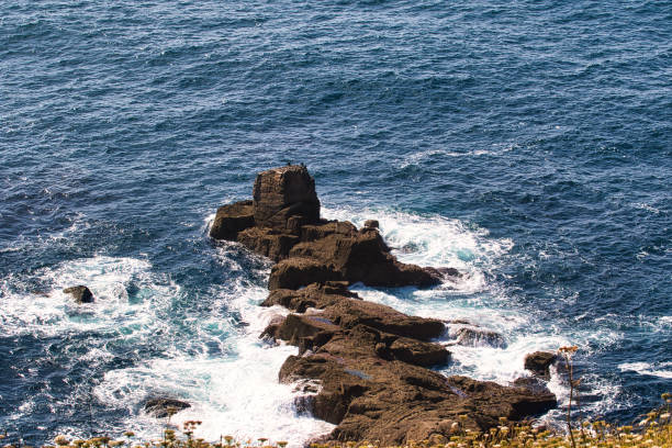 Big Sur is a rugged and mountainous section of the Central Coast of California.The Pacific Ocean meets the Santa Lucia Mountains with State Route 1 constructed on the towering seaside cliffs.