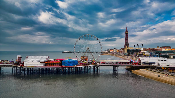 istock Seaside Pier with Ferris Wheel and Amusement Attractions 2173736279