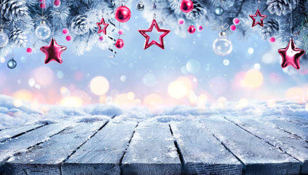 istock Christmas Winter Table With Red Ornament On Snow 2173737569