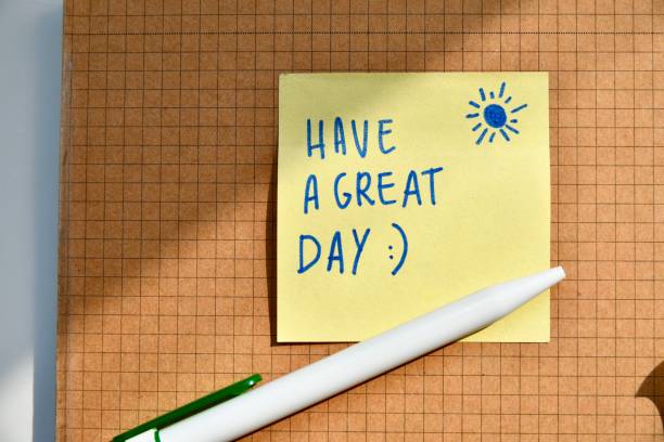 istock Good wishes written on a yellow Post-It sticky notes on a desk 2173743134