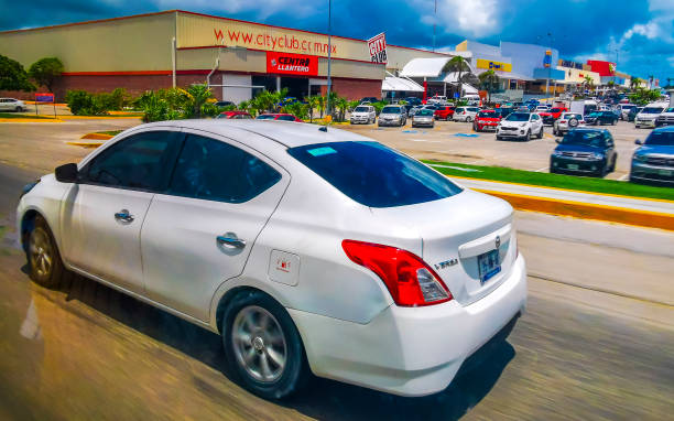Playa del Carmen Quintana Roo Mexico 07. July 2024 Various cars parked outside on the roadside in Playa del Carmen Quintana Roo Mexico.