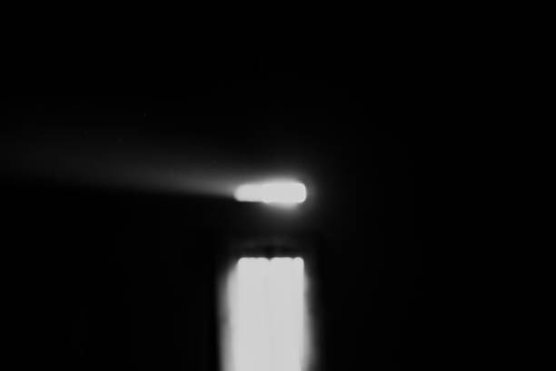 istock Sunlight comes in from a window in a dark room. 2173754281