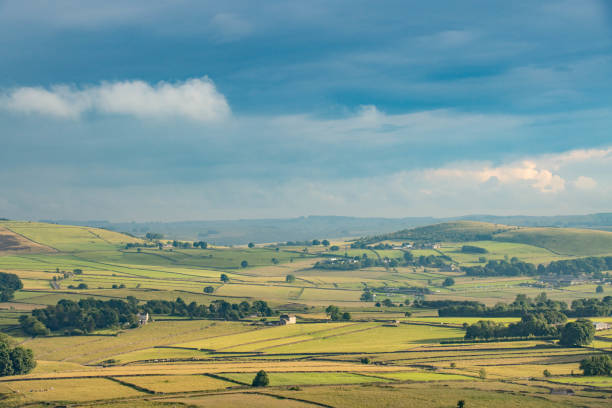 Rolling farmland from Eyam Edge, Bretton, Peak District National Park, Derbyshire, UK