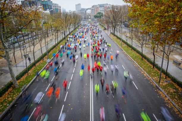 Popular race running along the Paseo de la Castellana in Madrid stock photo
