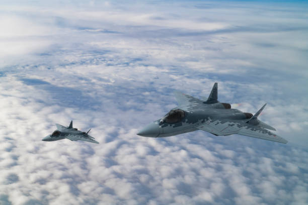 istock Jet fighters flying over snowcapped mountains. 2173763181