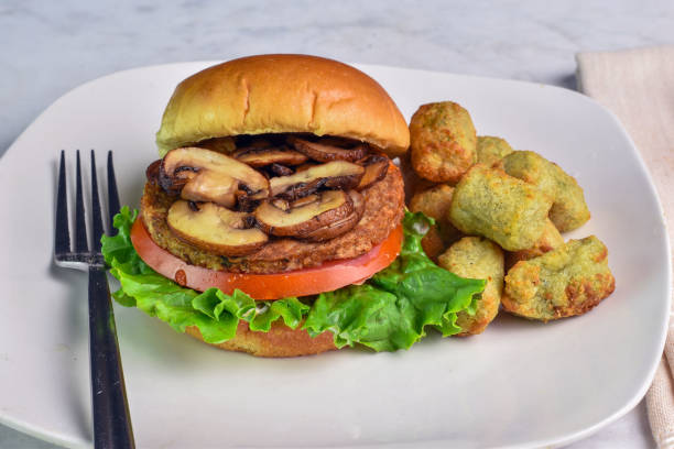 istock veggie mushroom burger with broccoli fries 2173763270