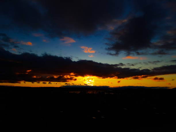 istock A dark moody cloudy sunset sky 2173769450