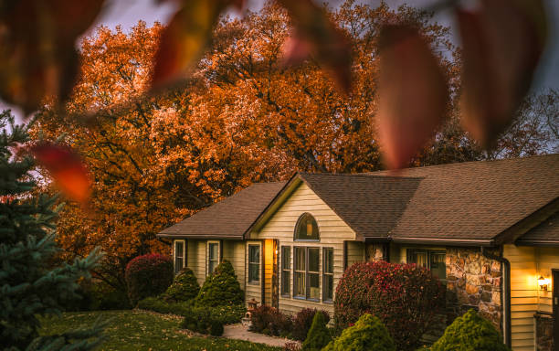 istock Midwestern suburban house on autumn evening 2173773004