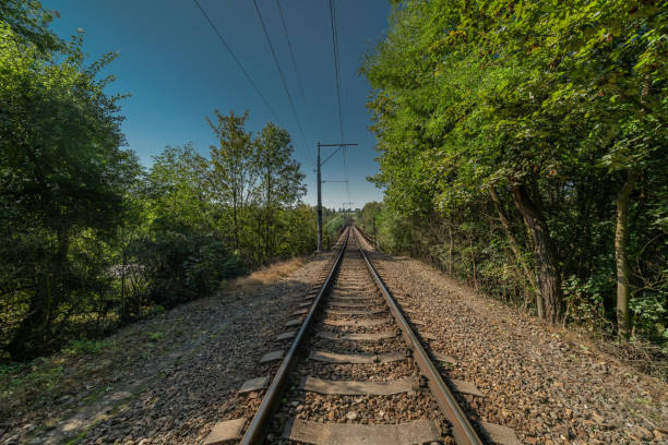 Empty railway track and bridge in summer sunny hot day in Tabor town