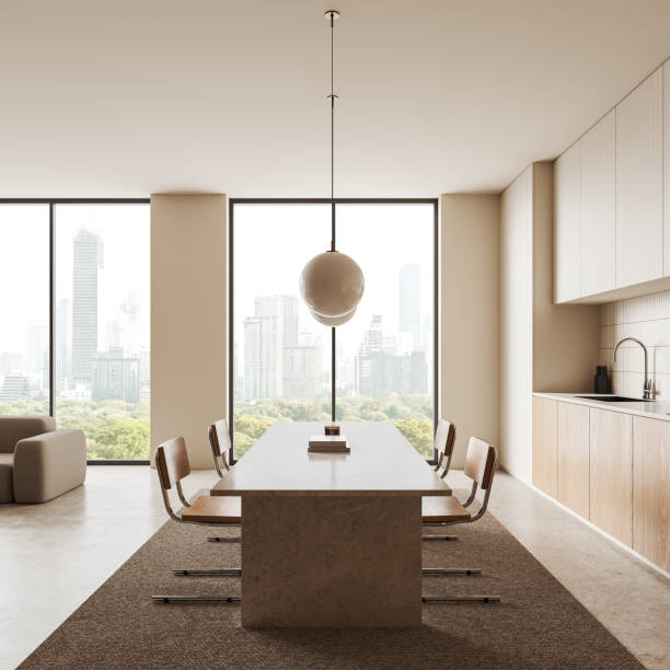 istock Home kitchen interior with dining table, cabinet and sofa near panoramic window 2173776148