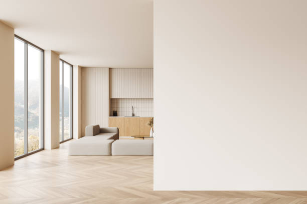 istock Beige home kitchen interior with cooking cabinet and sofa, window. Mockup wall 2173777570