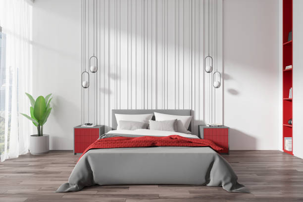 istock Modern bedroom interior with red accents and green plant. 3D Rendering 2173777881