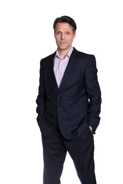 istock Middle-aged man standing smiling at camera, on white background, wearing formal clothes. 2173781246