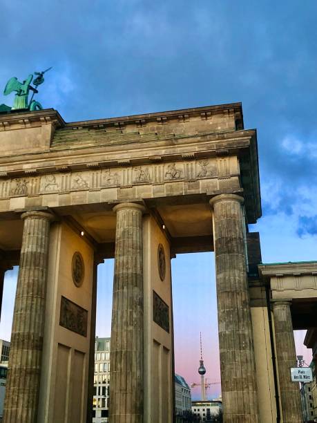 istock Berlin Brandenburg Gate with Television Tower in the background at Sunset 2173800414