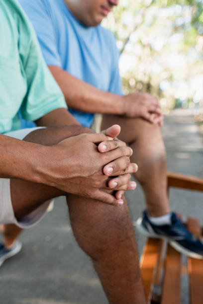 istock Lgtb couple experiencing knee pain after exercising together 2173802148