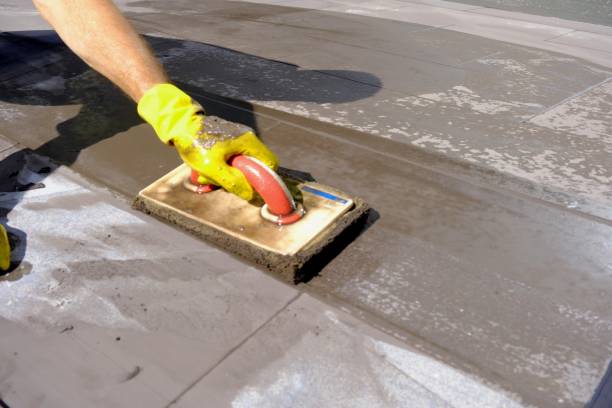 istock A plasterer polishes the parquet floor 2173807402