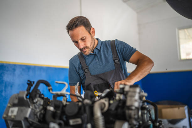 istock Car mechanic work on car engine with wrench in a garage setting 2173808733