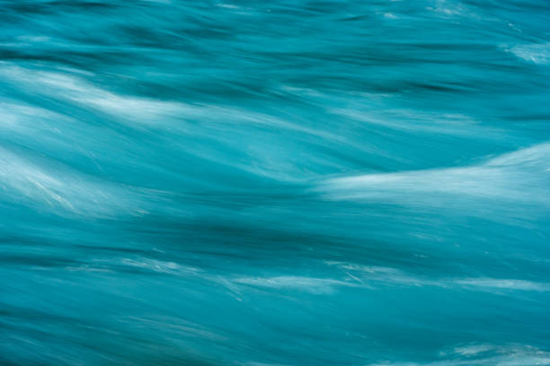 istock Waves of Blue Water Rush Across Image 2173811391