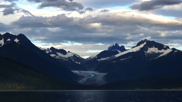 istock Alaskan Mountains Surround a Glacier Under a Cloudy Sky 2173811455