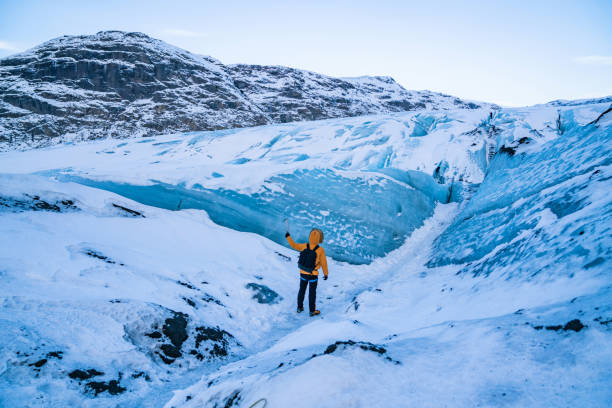 istock Hiker exploring majestic glacier landscape in winter 2173812235