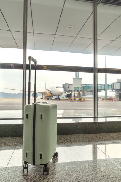 istock Suitcase in the modern airport. 2173815560