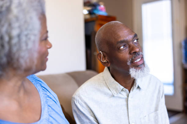 istock Senior black man wearing a hearing aid 2173821247