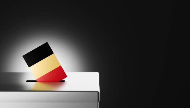 A Belgian flag, displaying its distinctive vertical black, yellow, and red stripes, is shown being placed into a ballot box, symbolizing the democratic process and civic participation in Belgium. This image captures themes of national pride, voting rights, and political engagement, making it ideal for illustrating Belgian elections, government activities, or voter awareness. Suitable for use in news articles, educational resources, and social media posts focused on Belgian democracy, elections, and civic responsibility.