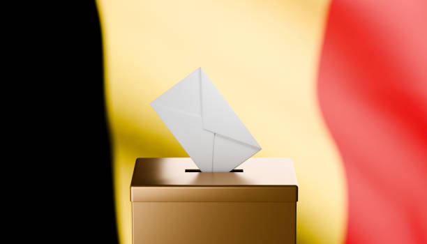 istock Envelope entering gold ballot box with a Belgium flag in the background 2173827892