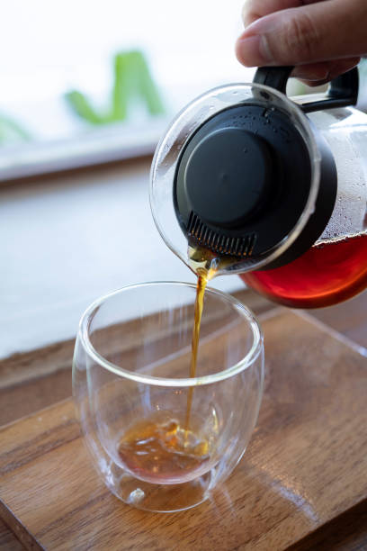 istock Pouring hot coffee into beautiful glass 2173828974