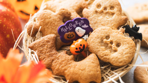 istock Handmade Halloween candy. Halloween pumpkin cookies and ghost cookies. 2173833231