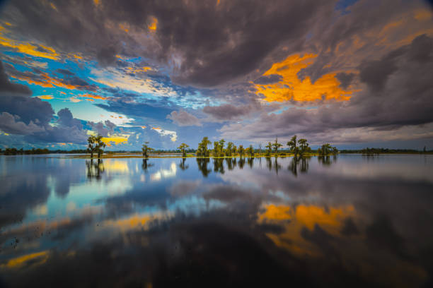 istock lake water clouds sunset landscape 2173836004