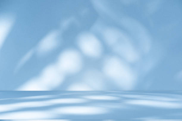 istock Studio style background wall decoration presentation uses white and blue tones. with shadows cast from a nearby window, concept creating a decorative 2173845352