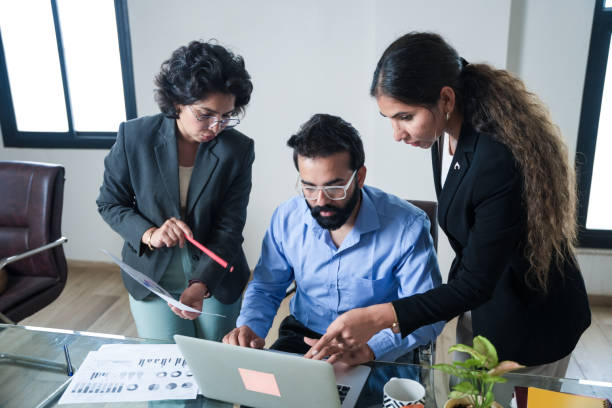 istock Professional indian business team working together on project while using laptop. financial planning and strategy concept. 2173859527