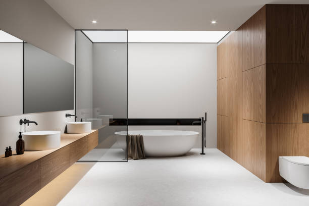 istock Modern bathroom interior with wooden elements and white bathtub. 3D Rendering 2173865954