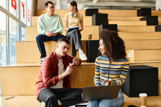 istock Diverse college students engaging in lively discussions on university staircase steps 2173873575