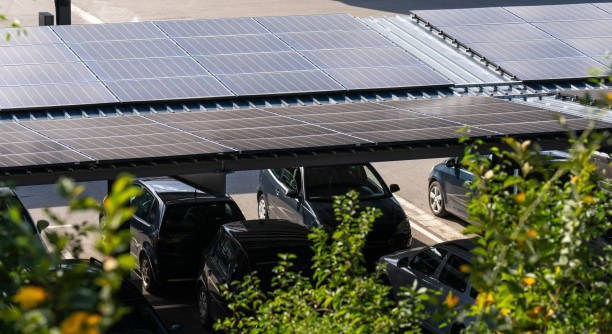 istock Parking space with solar panels on a roof. 2173877117