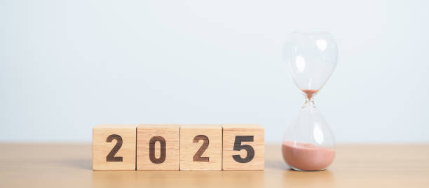 istock Happy New Year 2025 with hourglass on table. Resolution, time, plan, goal, motivation, reboot, countdown and New Year holiday concepts 2173877439