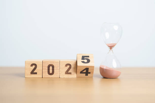 istock Happy New Year 2025 with hourglass on table. Resolution, time, plan, goal, motivation, reboot, countdown and New Year holiday concepts 2173877448
