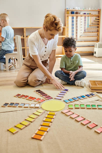Engaging Montessori teacher guides child in colorful learning activity
