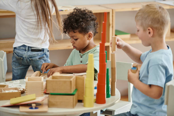 istock kids use Montessori materials for hands-on learning 2173879759