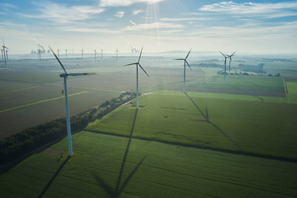 istock Renewable Energy - Wind Power Plants on Agriculture Field 2173884564