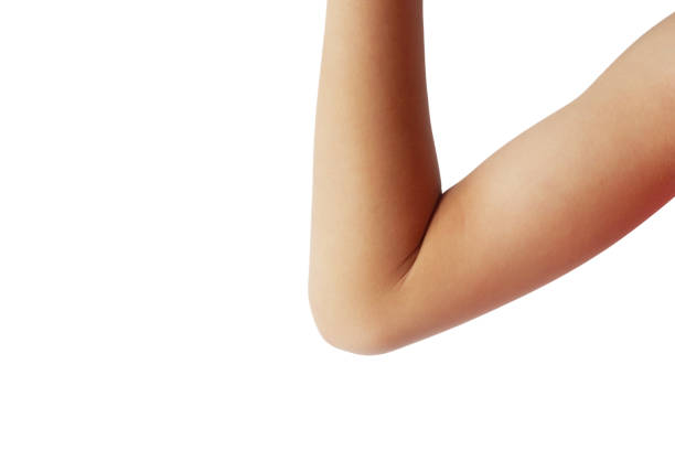 Healthy boy's arm and elbow on white background