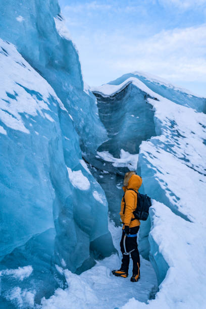 istock Climber getting ready to ascen an ice wall 2173885094
