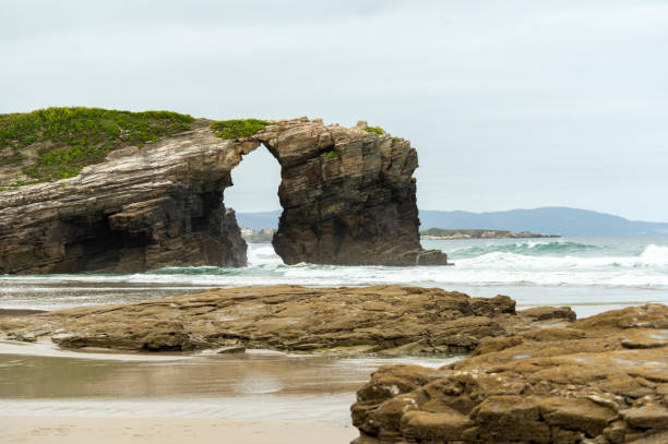 istock Natural Archway Formed by Coastal Erosion and Waves 2173885438