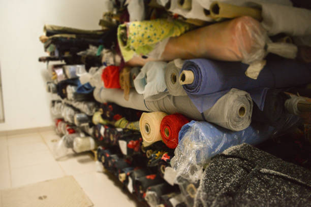 istock A vibrant stack of multi-colored fabric rolls, arranged in diverse palette. Perfect for sewing, crafting, and design projects. Fashion designers, tailors, and textile materials 2173886818
